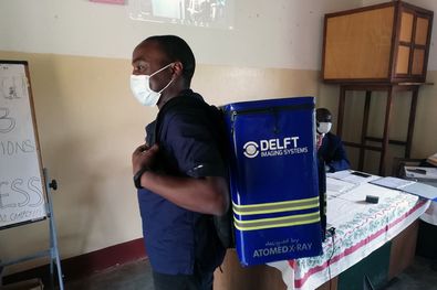 A radiographer wears Delft Light backpack in Uganda