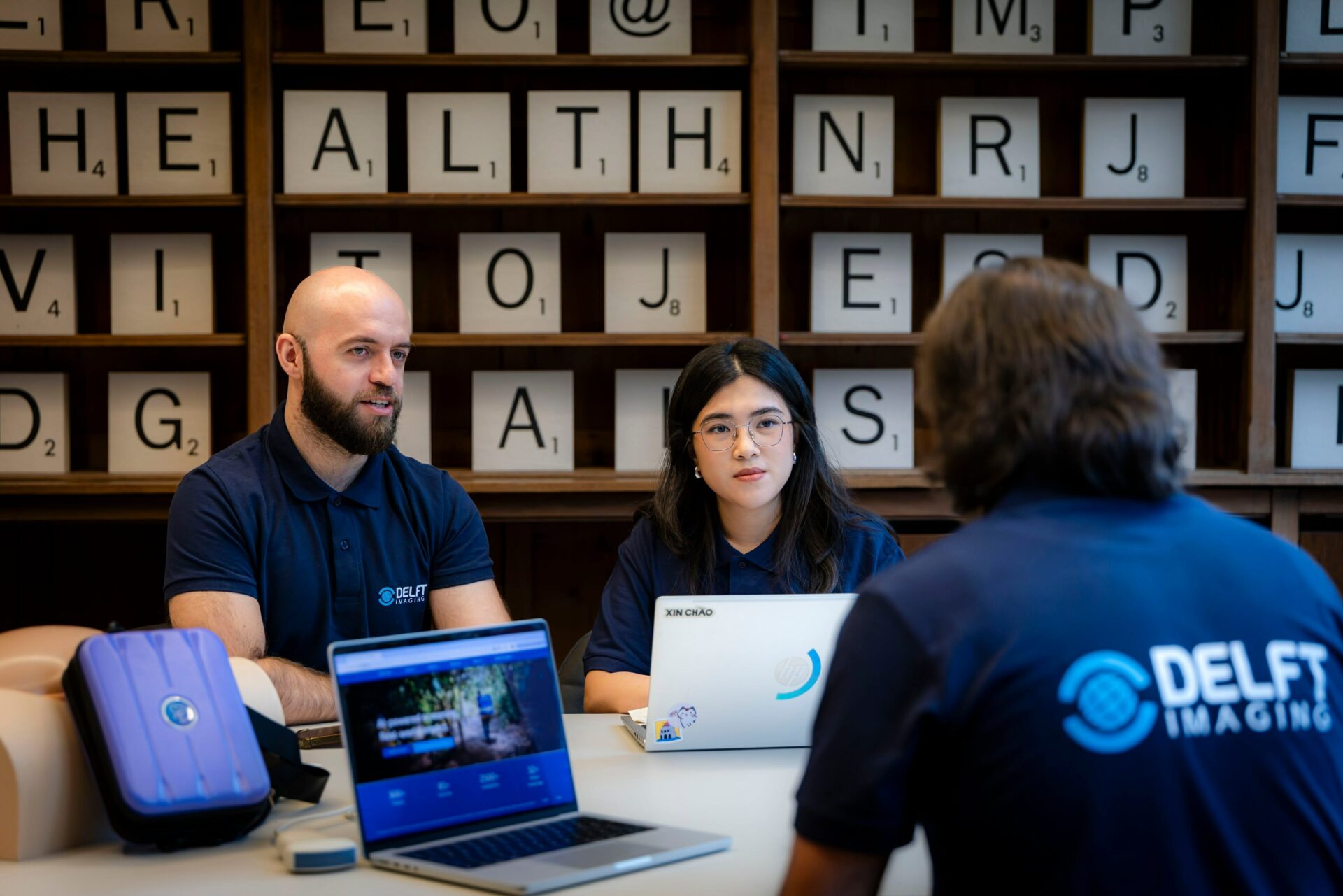 employees discuss with each other